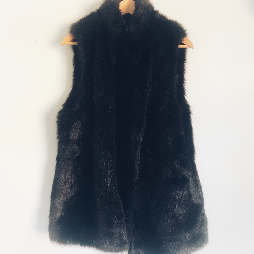 Long black faux fur vest